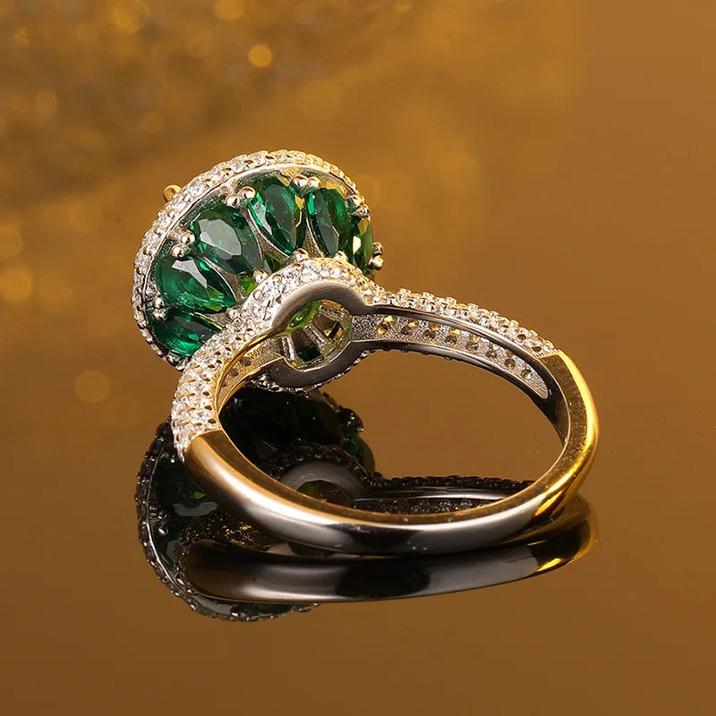 Platinum ring with artificially Cultivated Emerald and Diamonds