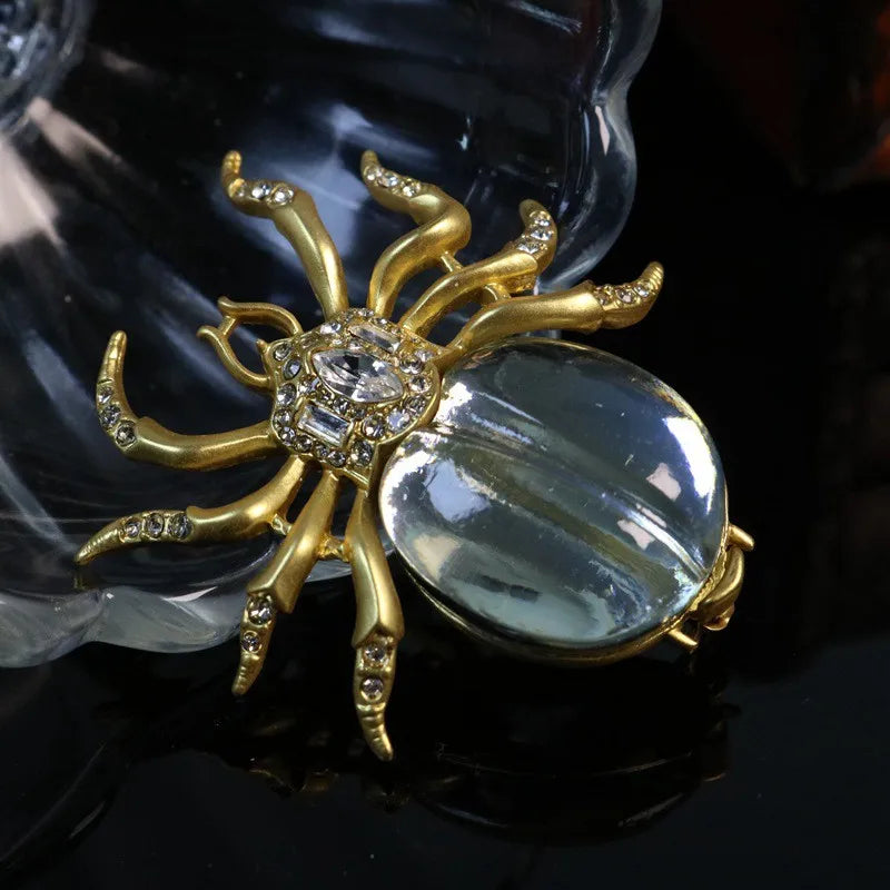 Spider glass brooch
