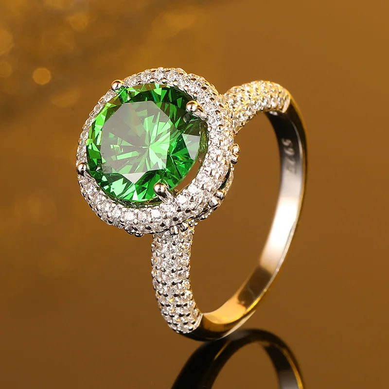 Platinum ring with artificially Cultivated Emerald and Diamonds