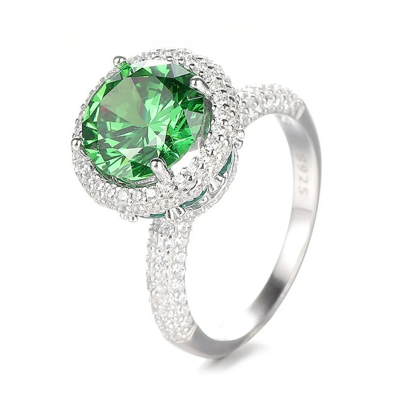 Platinum ring with artificially Cultivated Emerald and Diamonds